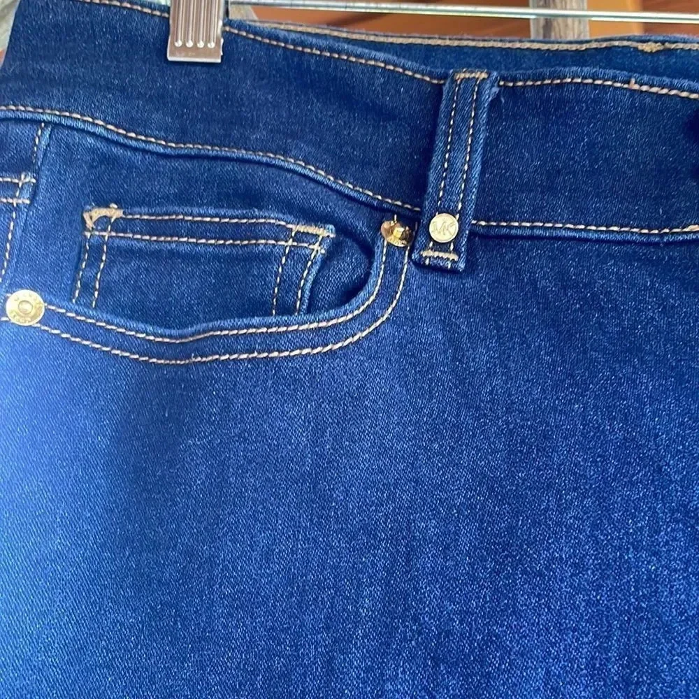 Michael Kors woman’s dark blue jeans. They are a size 10